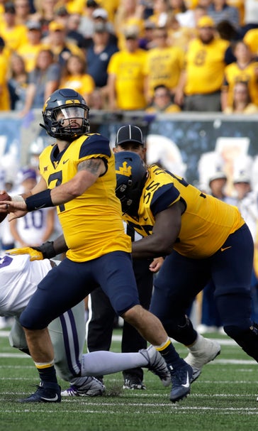 Grier throws 5 TDs, No. 12 WVU rocks Kansas State 35-6